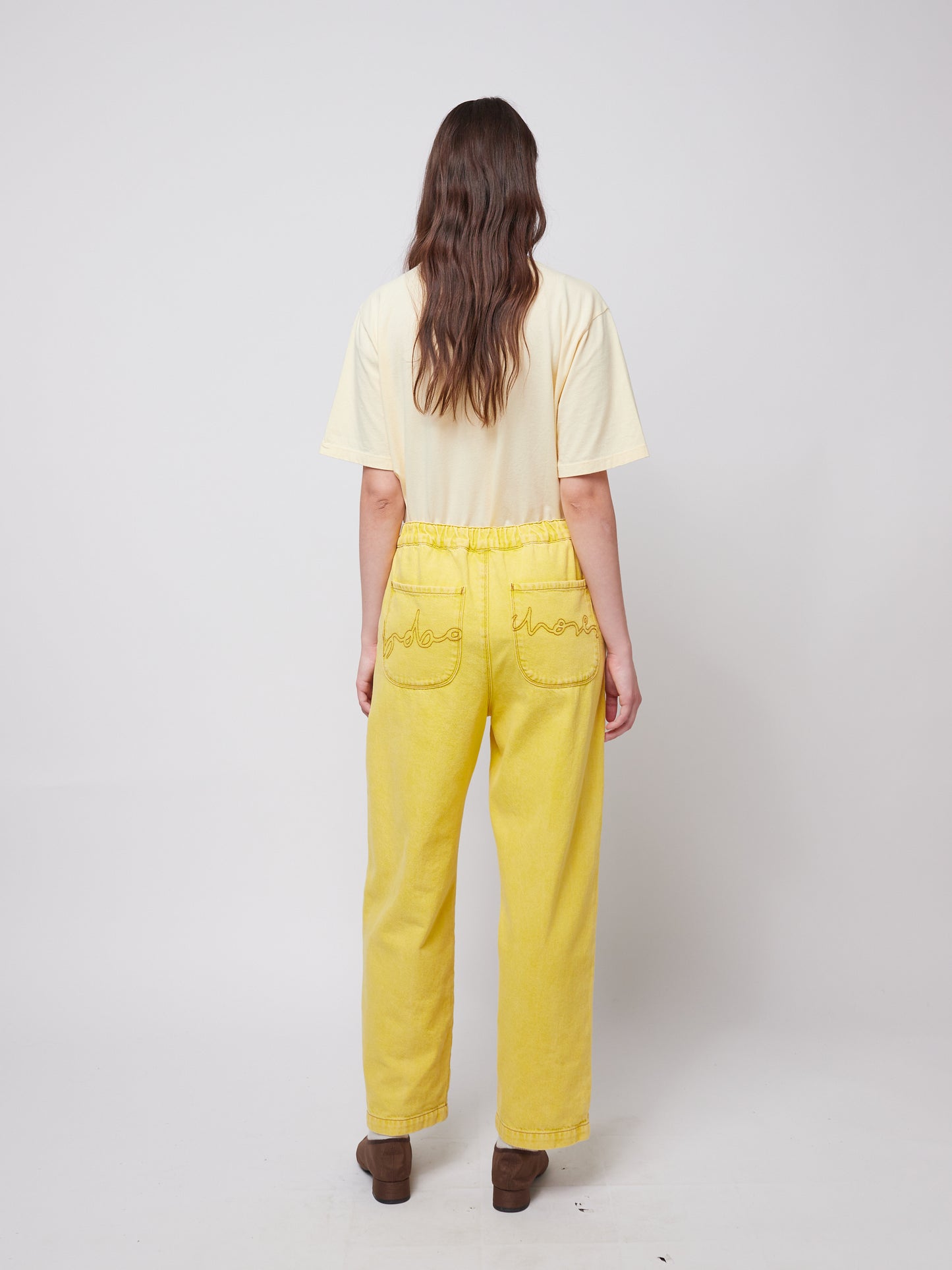 WASHED YELLOW JEANS